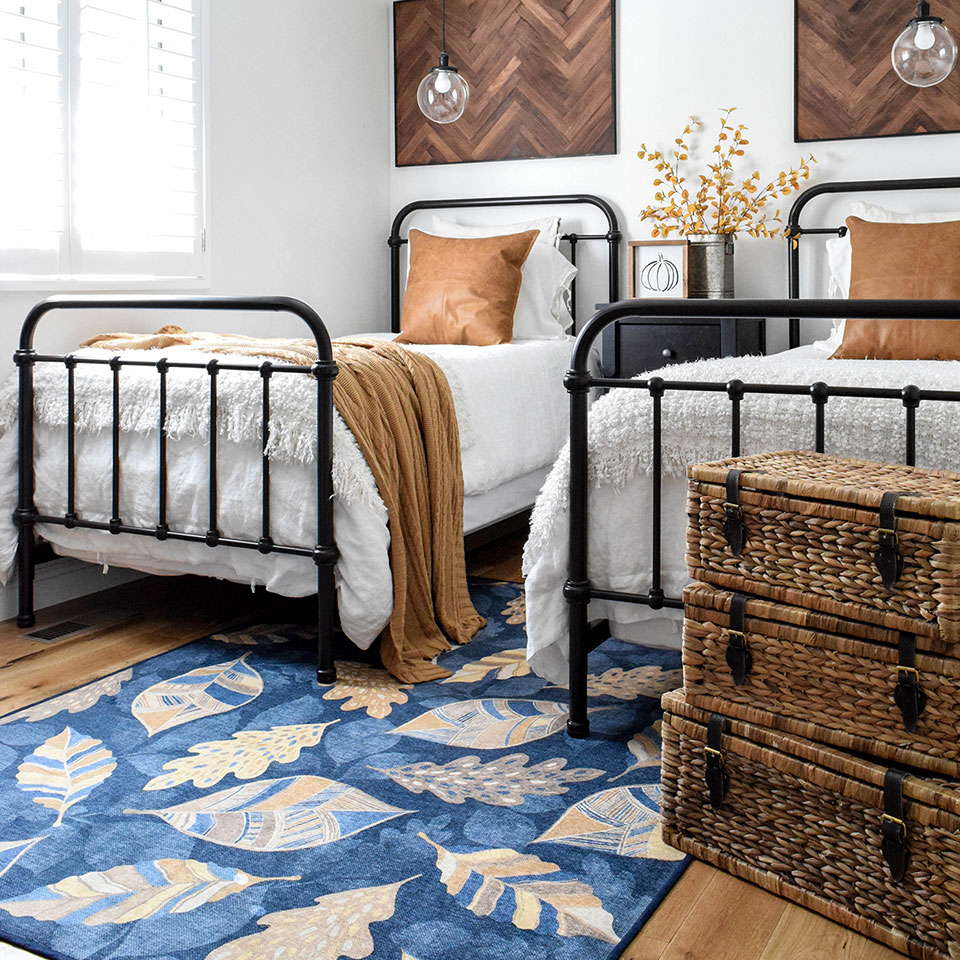 Blue and Gold Leaf Rug Under Twin Beds
