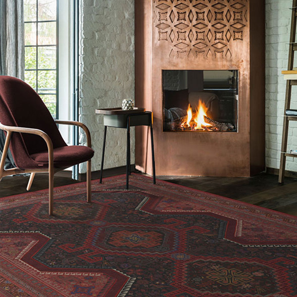 Zareen Oxblood Red Rug by Fireplace