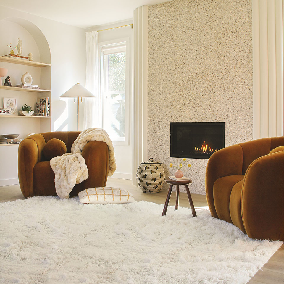 white shag rug in living room with accent chairs
