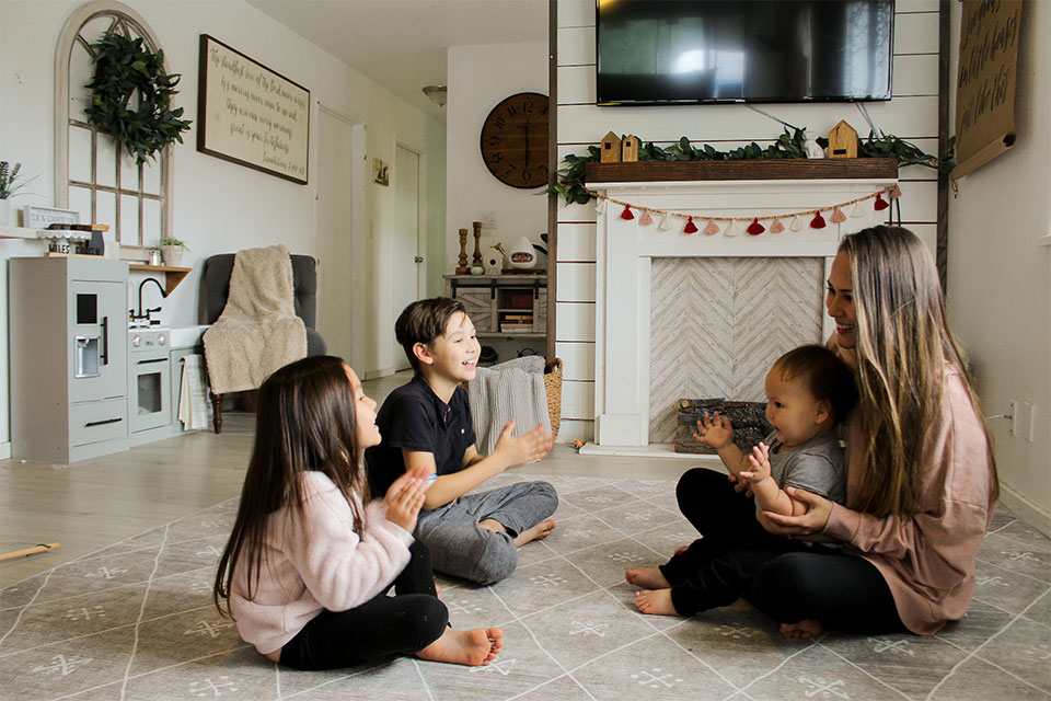 Mom and kids playing in the living room
