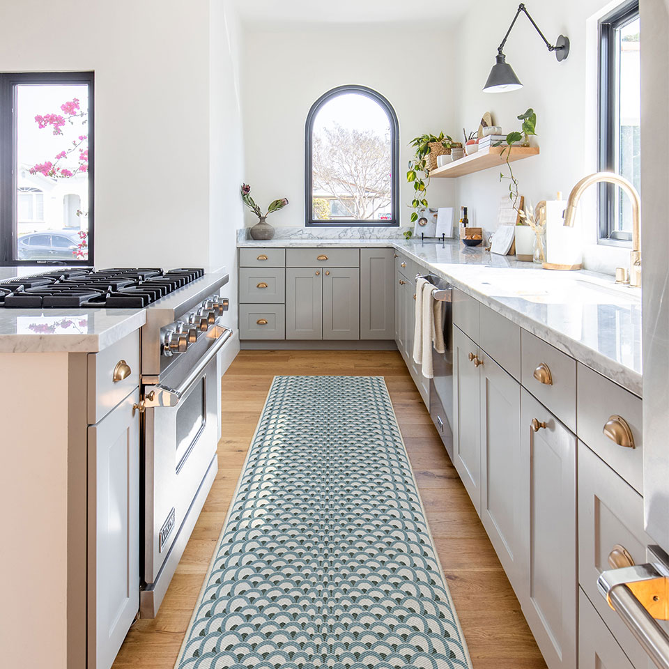 Teal blue and white patterned kitchen runner