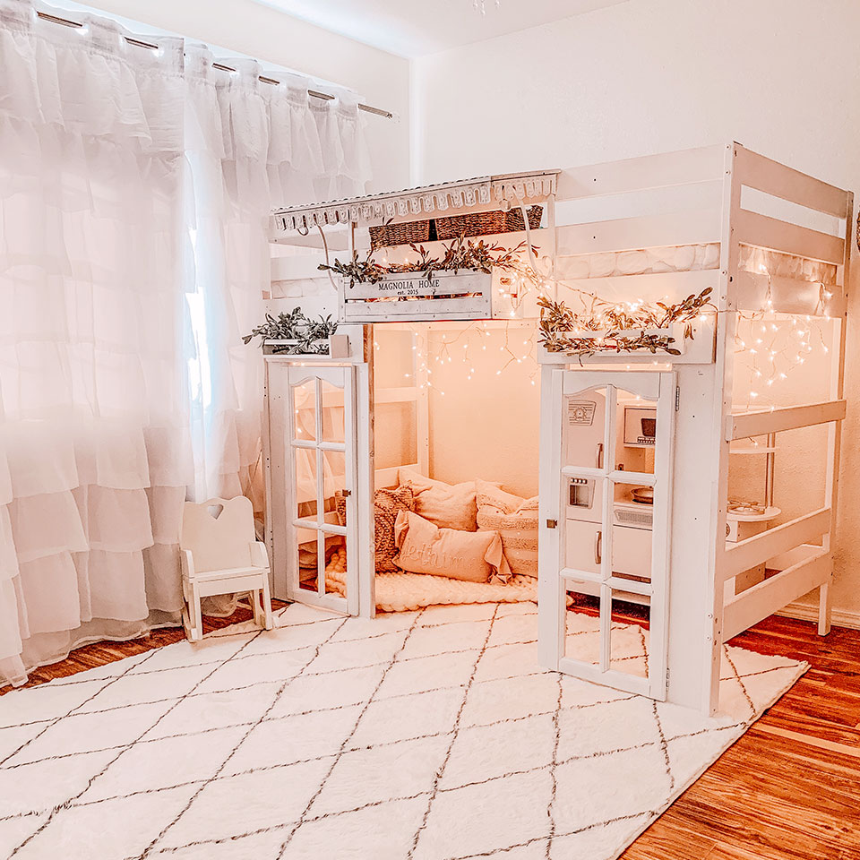 White plush rug with diamond pattern in kids room with double deck bed and lights