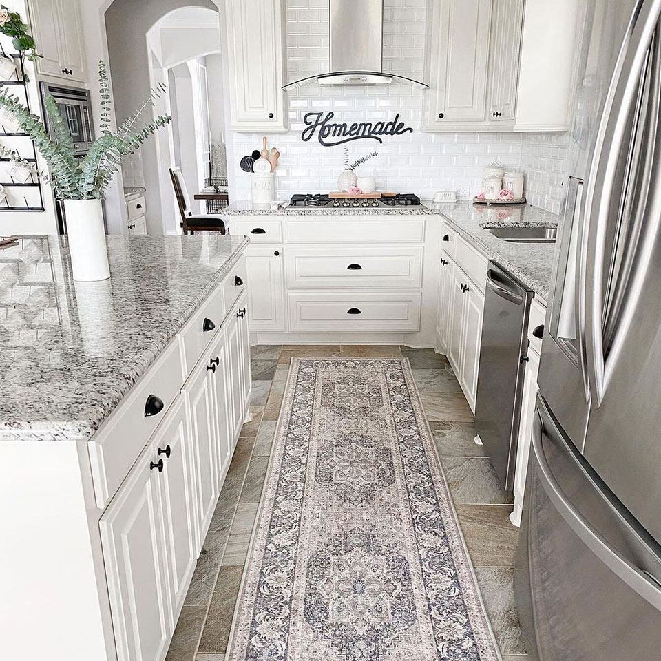 blue and neutral persian runner rug in neutral kitchen