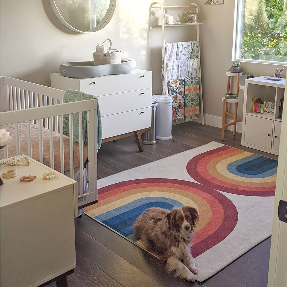 rainbow nursery rug with white decor