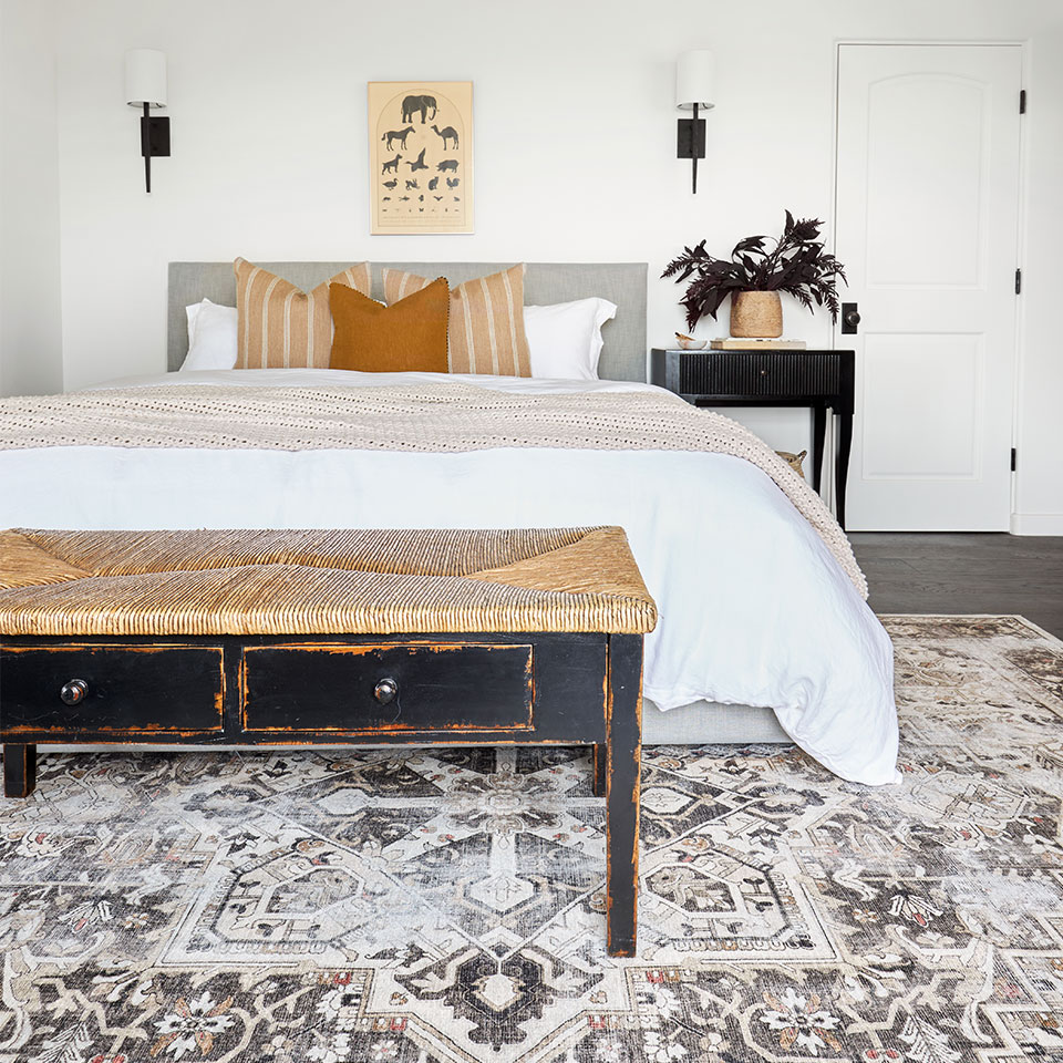 neutral bedroom with persian rug