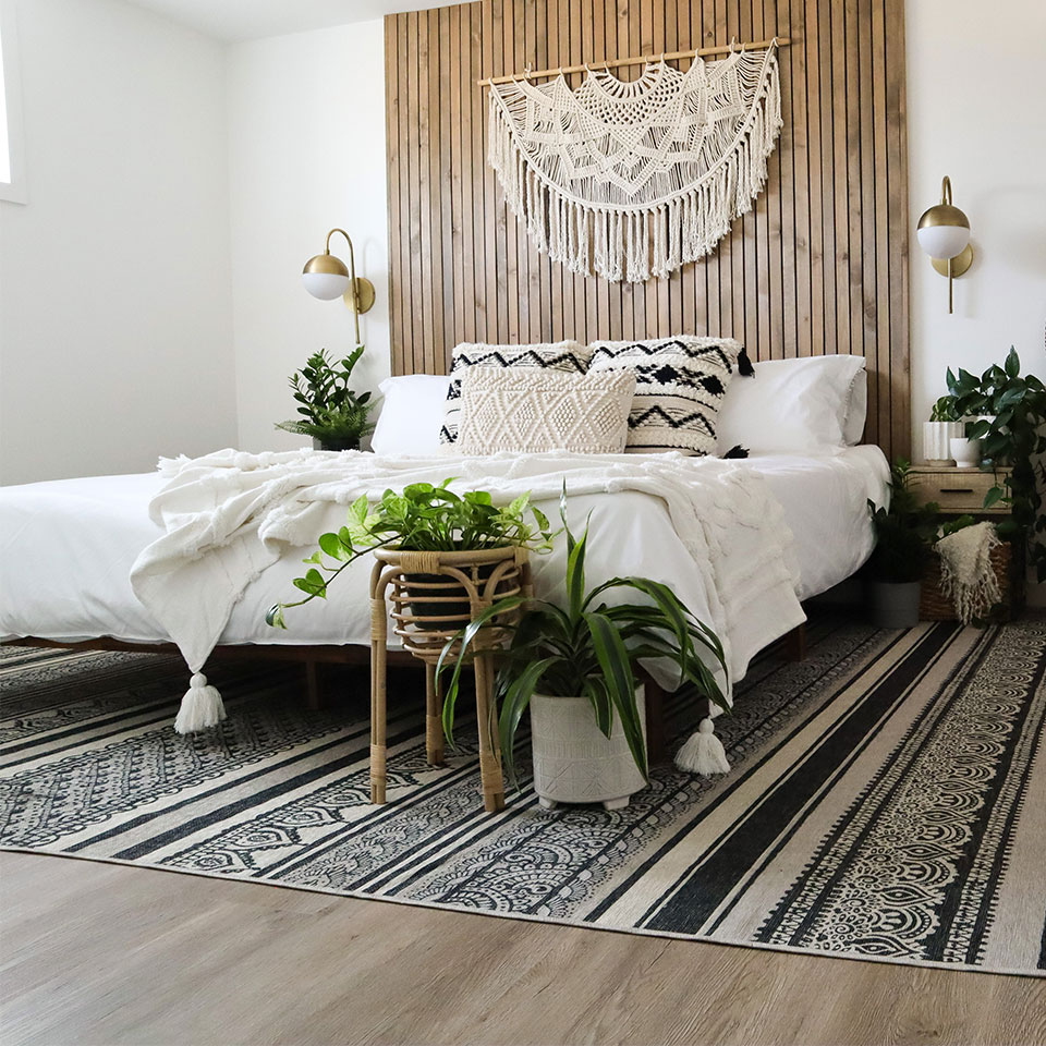 black and white geometric rug in boho bedroom