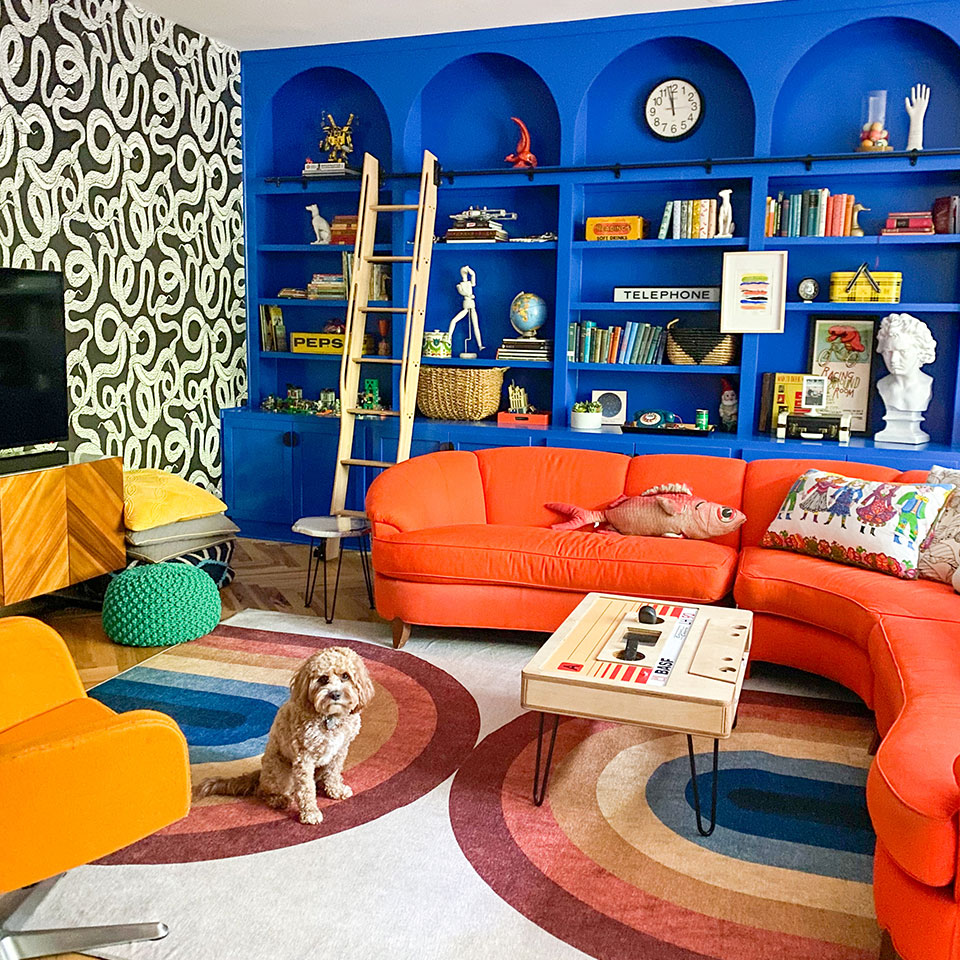 unique rainbow rug in colorful eclectic living room