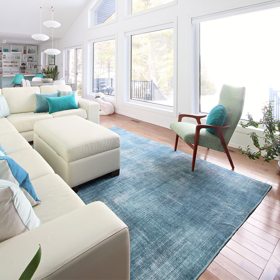 calming teal blue rug in living room