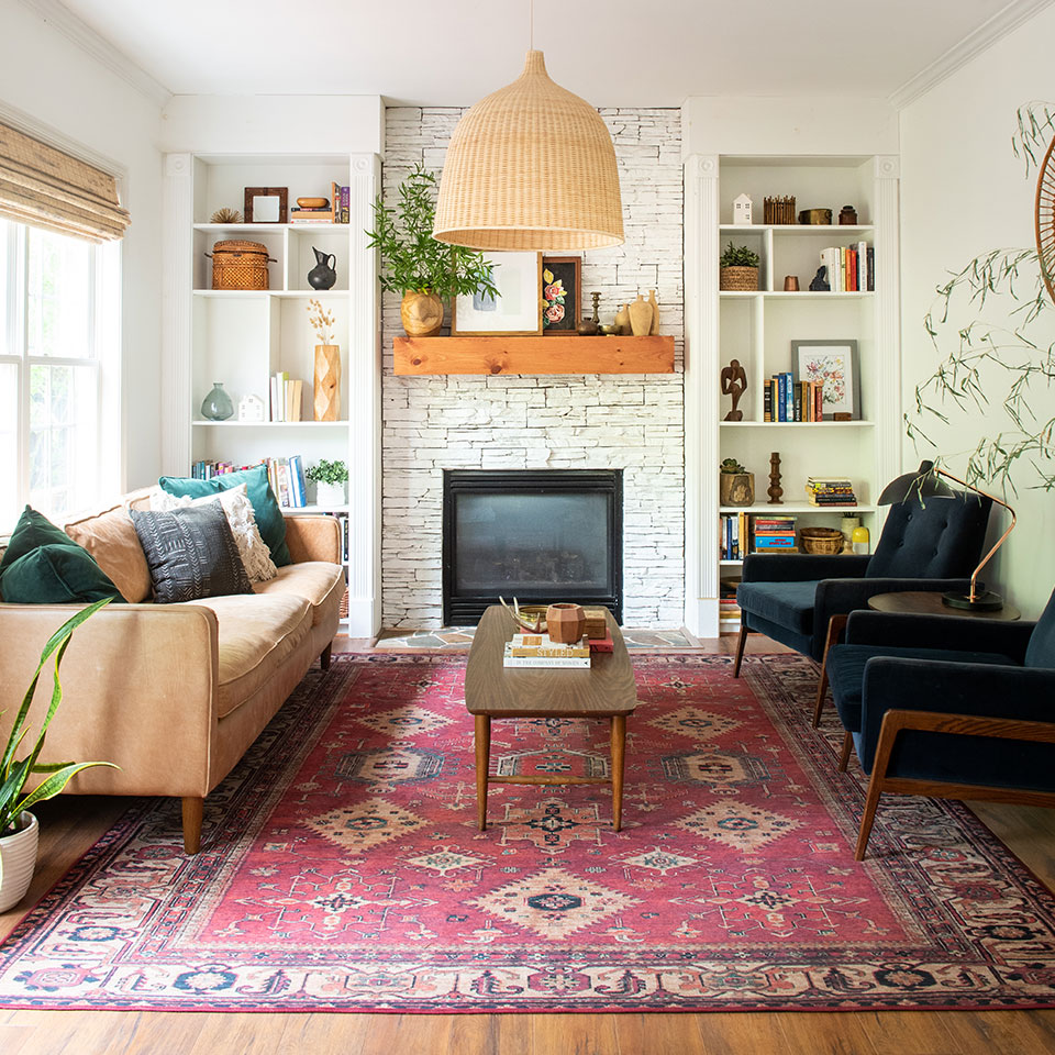 energizing red persian rug in living room