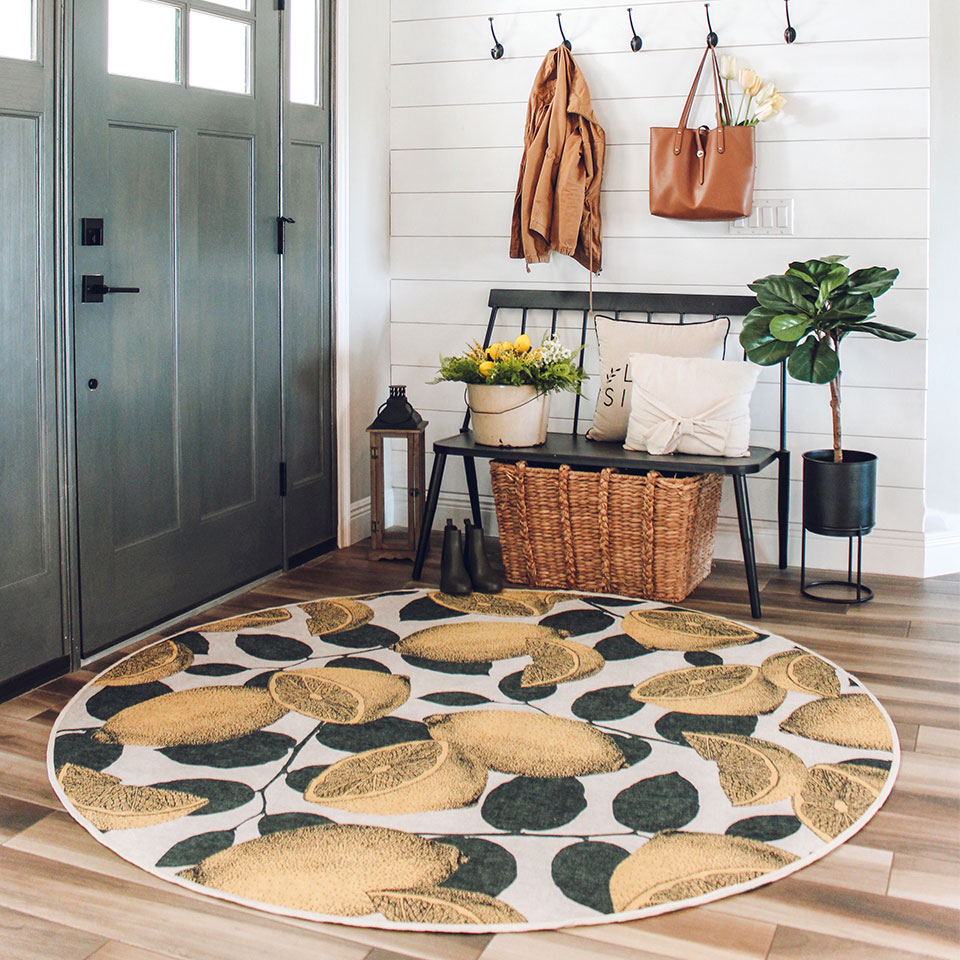 energizing yellow fruit rug in entryway with farmhouse decor