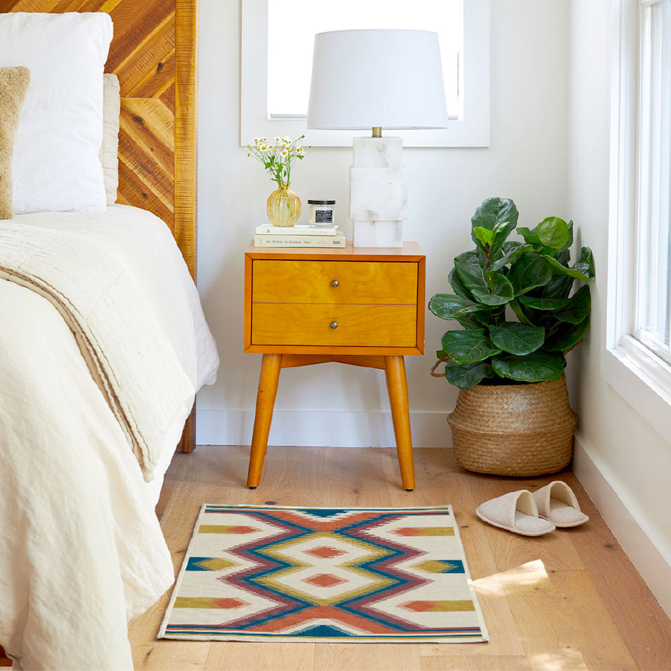 small bedside rug with southwestern pattern