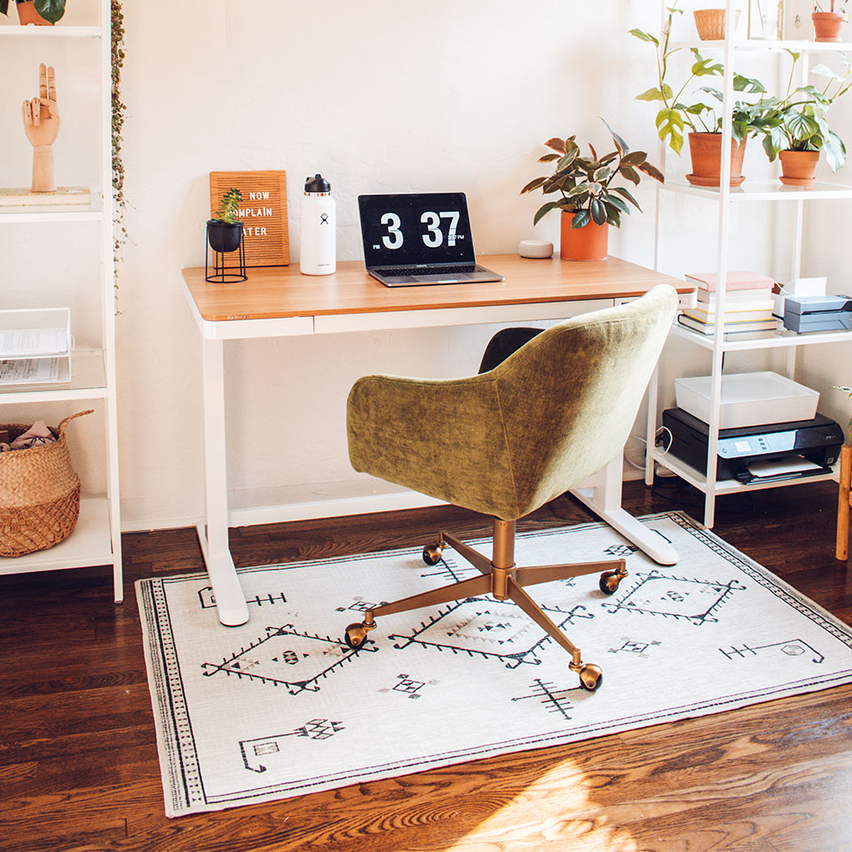 small black and white boho rug in office