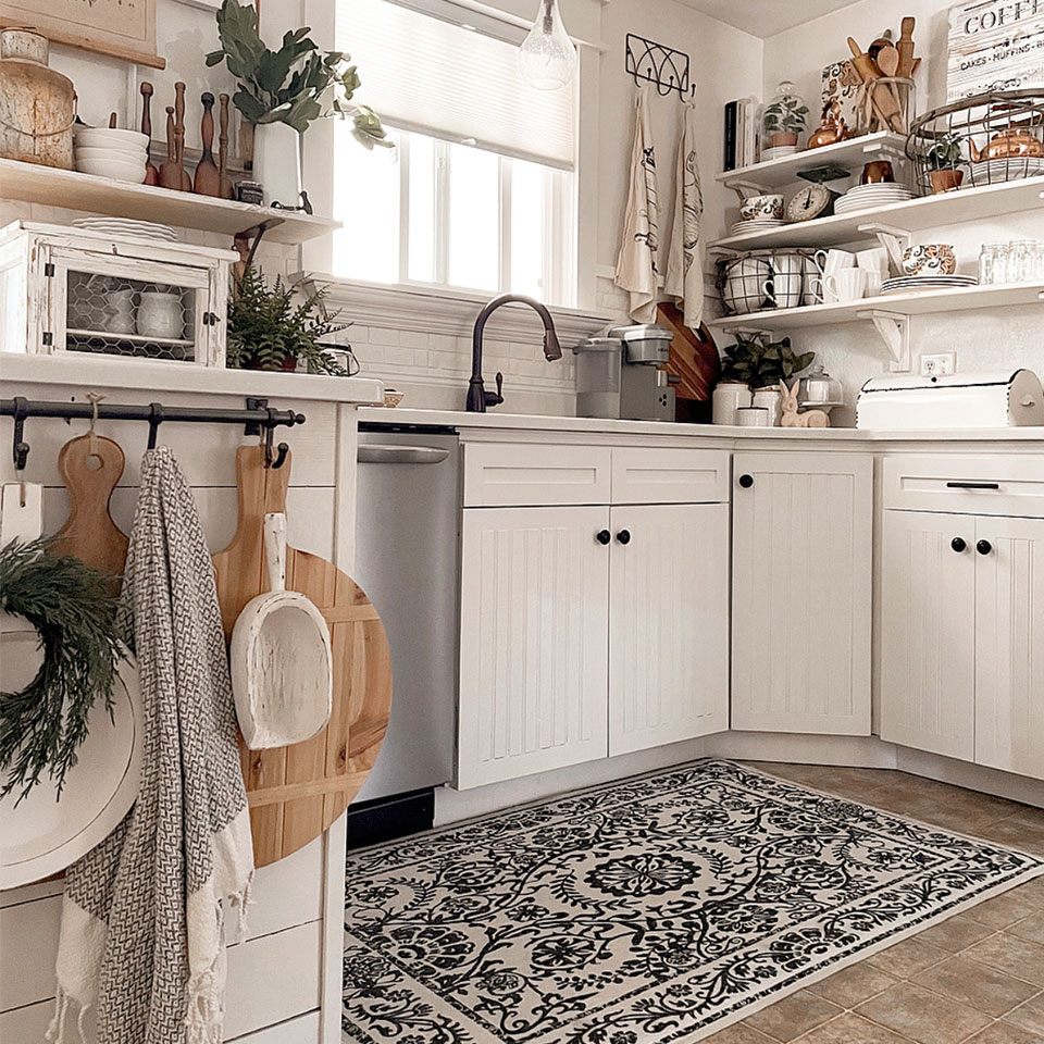 black and white floral rug in farmhouse kitchen