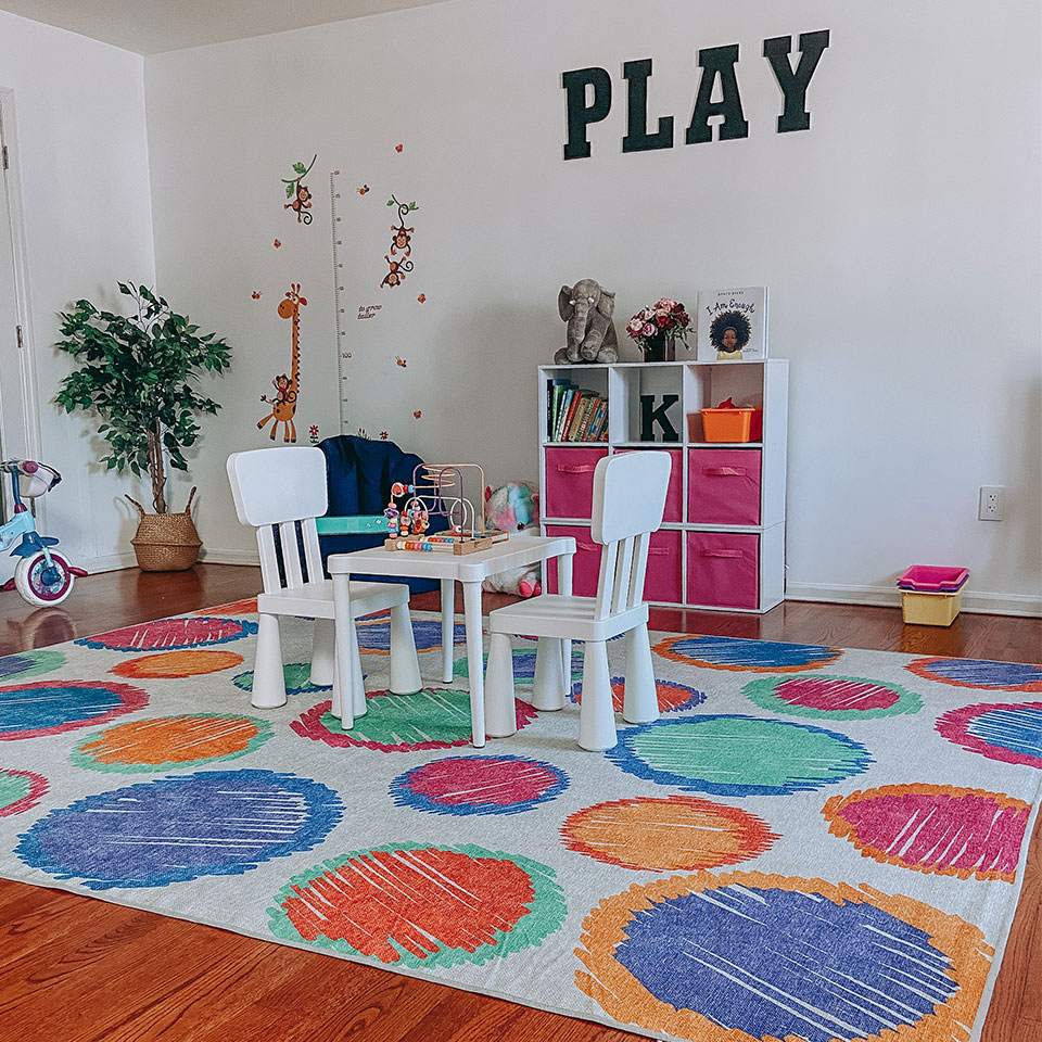 colorful abstract rug in kids playroom