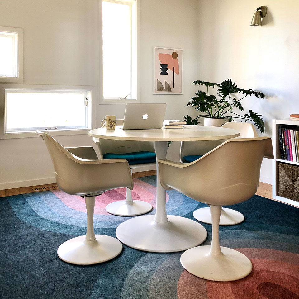 retro rainbow rug in home office