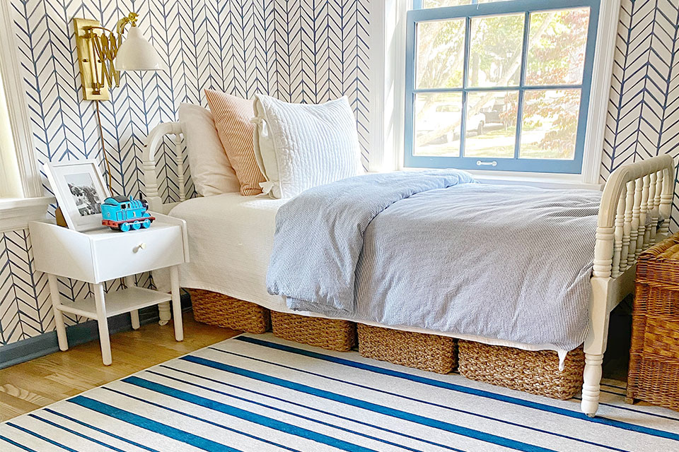 blue and white striped rug in nautical kids room