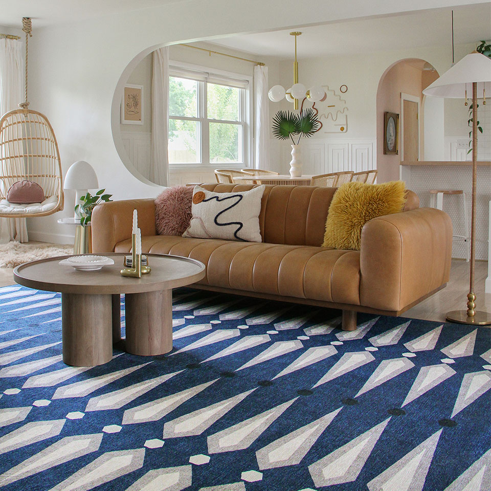 blue and white retro rug in living room