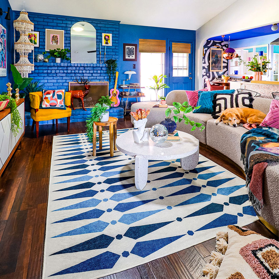 maximalist blue and white rug in living room