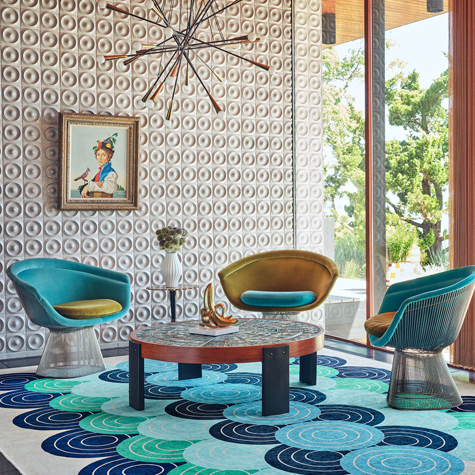 maximalist teal and blue rug in living room