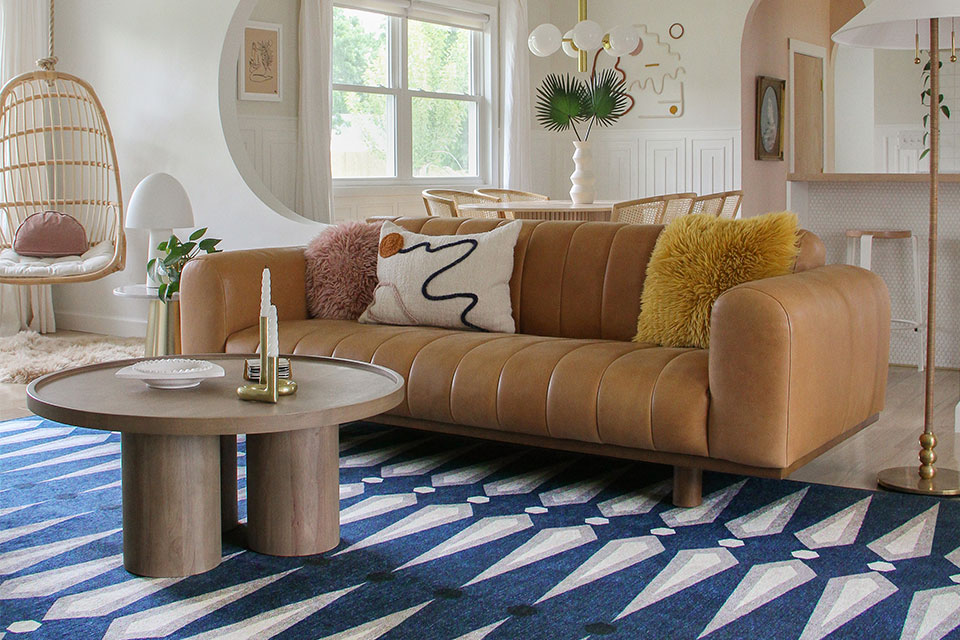 retro blue and white rug in living room