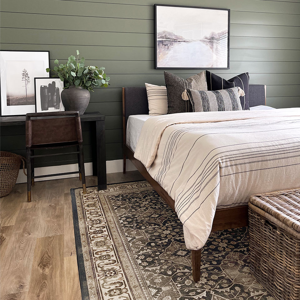 brown persian rug in bedroom