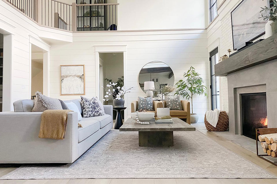 cream and grey persian rug in large living room
