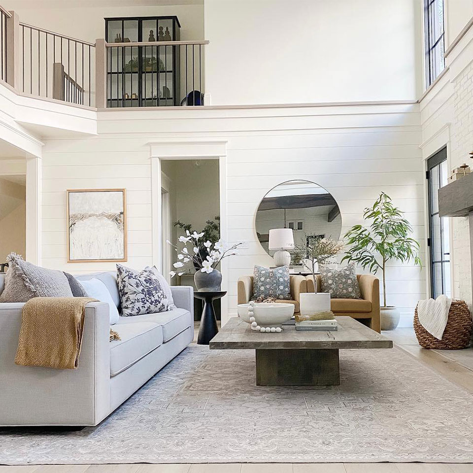 cream and grey persian rug in large living room