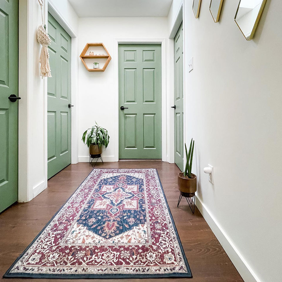 red and blue persian rug in hallway