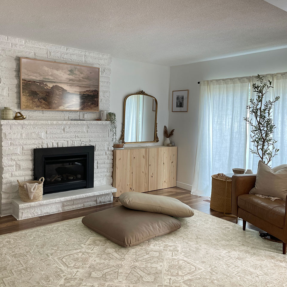 tan persian rug in scandi living room