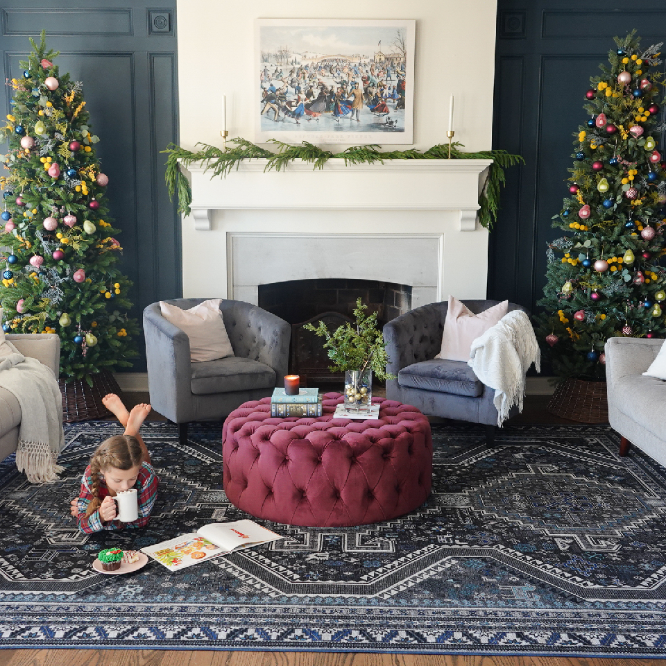 christmas home decor in living room with blue Persian rug