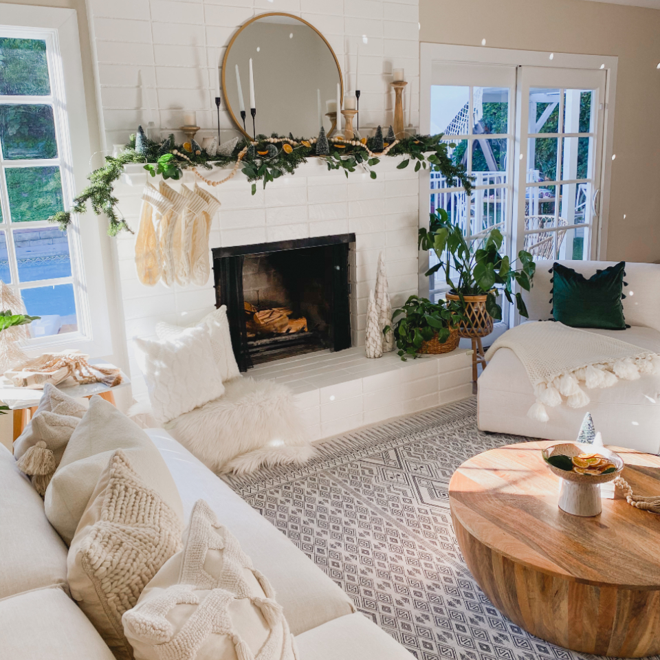 christmas home decor in living room with geometric neutral rug