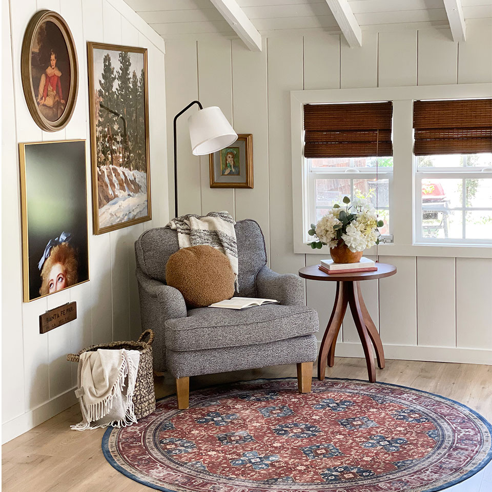 red persian rug in reading nook