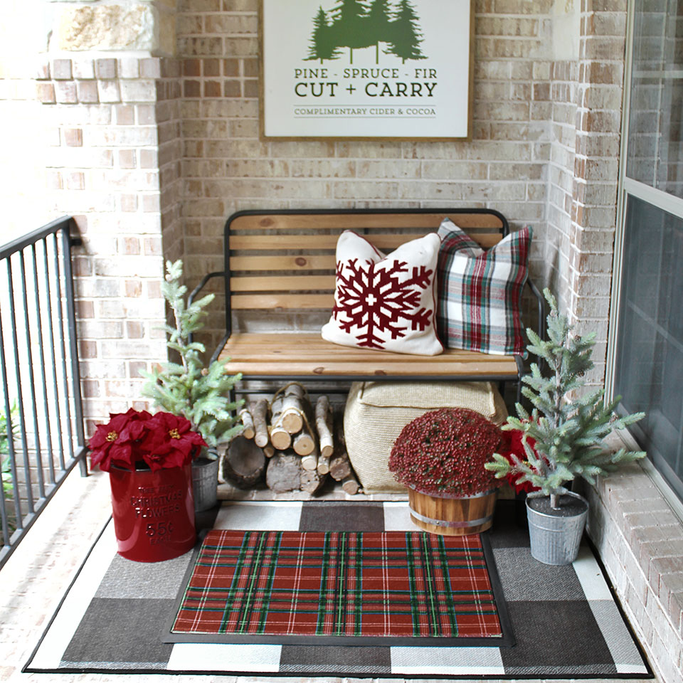 red plaid doormat on patio