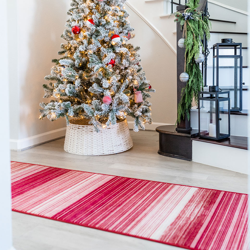 red runner rug in entryway-with-christmas-decor