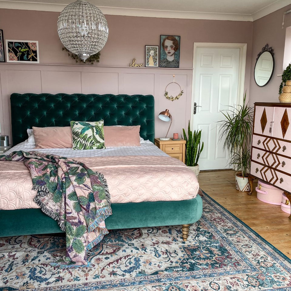teal persian vintage rug in bedroom