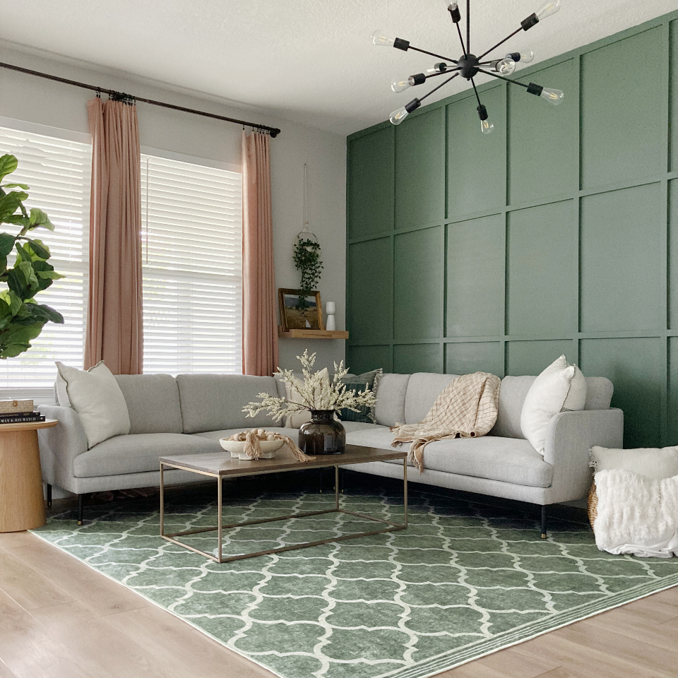 green geometric rug in living room
