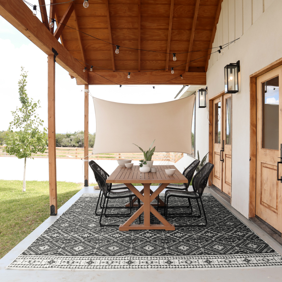 black and white rug on outdoor patio