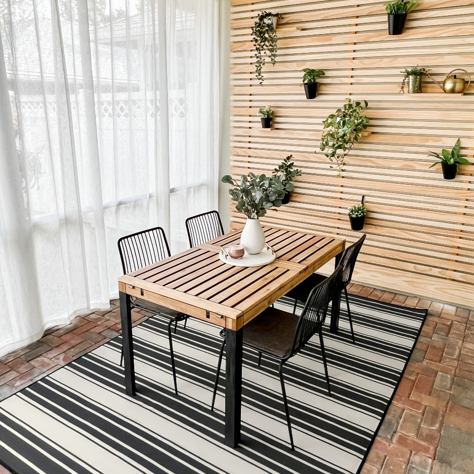 black and white striped rug on patio