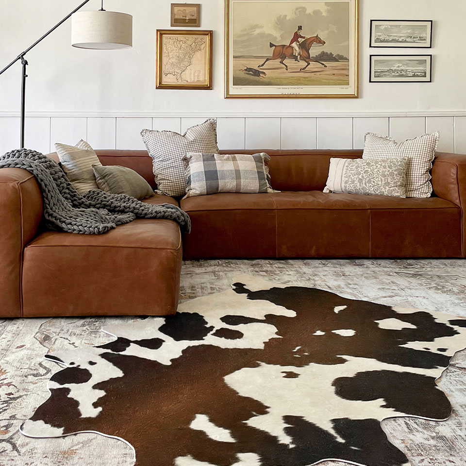 faux hide rug in living room